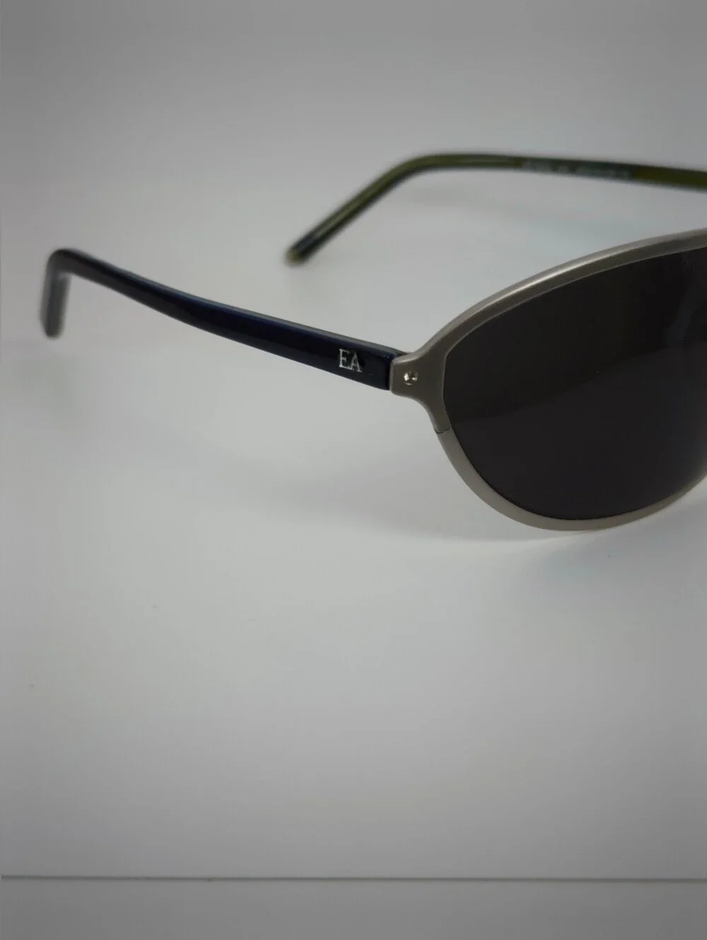 Elizabeth Arden Oval Wrap Sunglasses with Dark Lenses and Silver Frame